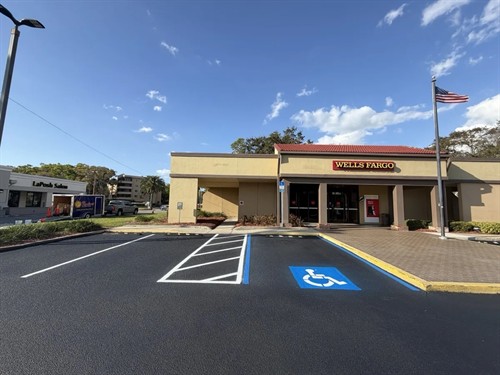 Wells Fargo parking lot sealcoated with new ADA stalls by Radiant Striping, Tampa