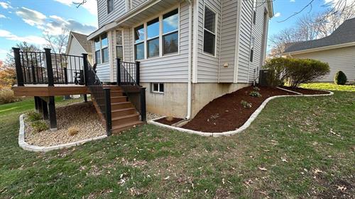 Planted beds with Fond Du Lac edging