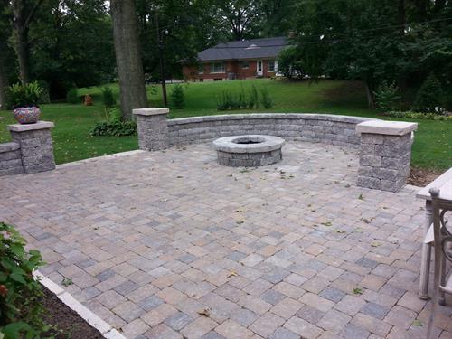 Paver patio with built in firepit and bench