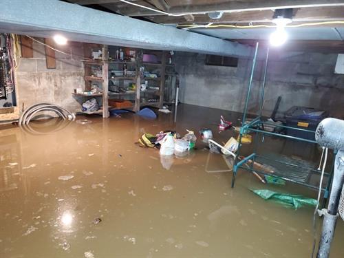 Flooded basement cleanup Flooded basement cleanup