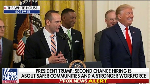 John Koufos on stage at the White House with President Donald J. Trump