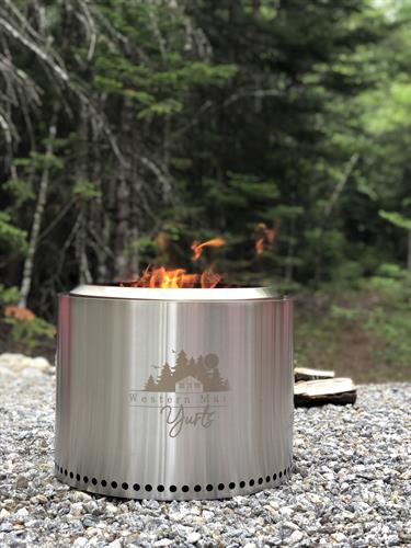 Solo stoves with included firewood and accessories for outdoor fires