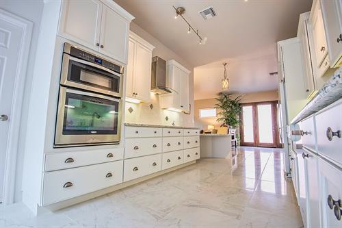 Vision House Tucson kitchen stove and cabinets