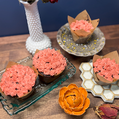 Strawberry-frosted chocolate cupcakes