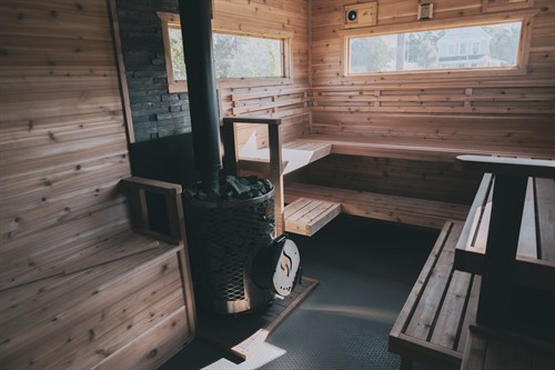 Wood-fired, cedar-lined sauna.