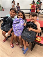 Walter Clark Legal Group Continues Distributing 4,500 New Backpacks Filled  with School Supplies to Local Students