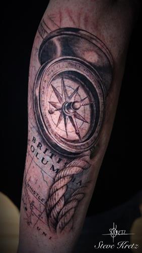 Compass & map black & grey tattoo - Tattooed in Whistler by Steve Kretz