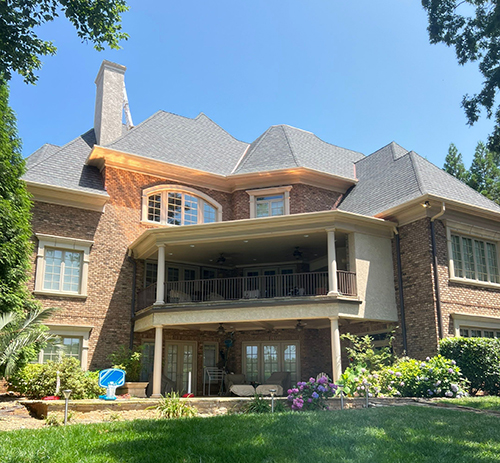 This home in Matthews looks fantastic with a new roof, including copper!