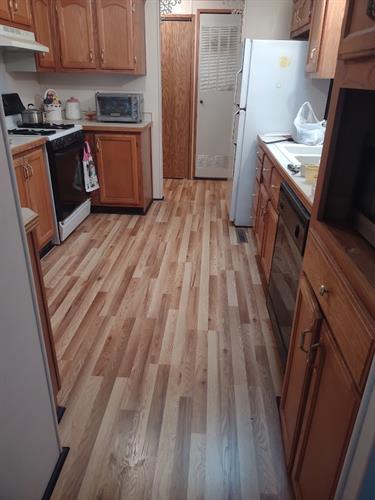 Repaired a subfloor and laid down new flooring. 