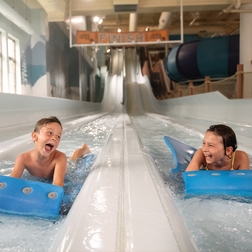 Waterslide Race at Avalanche Bay Indoor Waterpark at Boyne Mountain