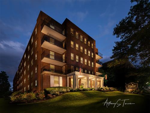Commercial Image: Light painted apartment building for a property manager. This was done through dozens of separate images to light the building to create their "hero image" for their marketing.