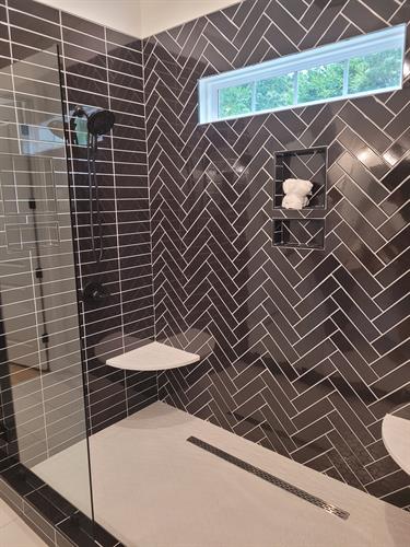 Upgrade your shower to a luxury experience with professional tile installation.
