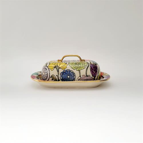 Butter dish with multi color flowers and gold.