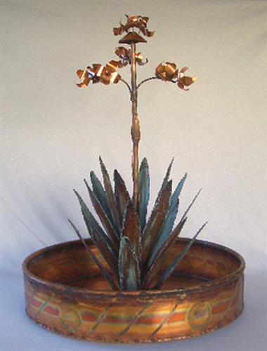 copper water fountain Agave cactus 5 feet tall 4 feet wide at the base