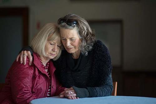 Gallery Image sisters-mourning-at-home-funeral.jpg