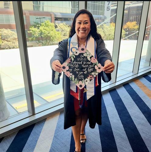 2024 Nightingale College Graduate shows their personalized cap