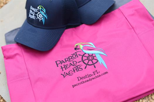 People ask and the answer is YES!  We do have hats, shirts, and waterproof beach totes with our very popular logo embroidered on them