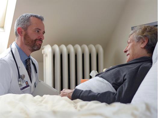 Gallery Image Photo_2_MD_with_Patient.jpg Gallery Image Photo_2_MD_with_Patient.jpg