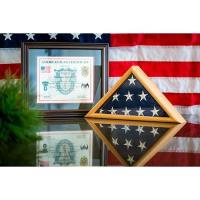 Local Green Beret Presents Howard Hospitality with Flag of the United States