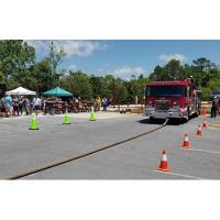 Four Rotary Clubs and Community Pull Together To Raise Funds at Inaugural Fire Truck Pull