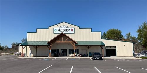 Gallery Image Wooster_Store_Paved_Front_early_spring_2024_cropped_summer_sky.png