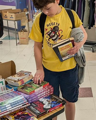 Gallery Image boy_with_book.jpg Gallery Image boy_with_book.jpg