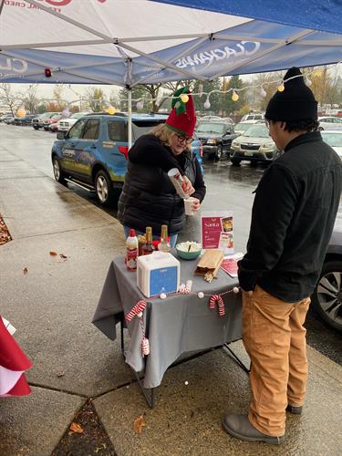 Hilary serving up Hot Cocoa to our partners.