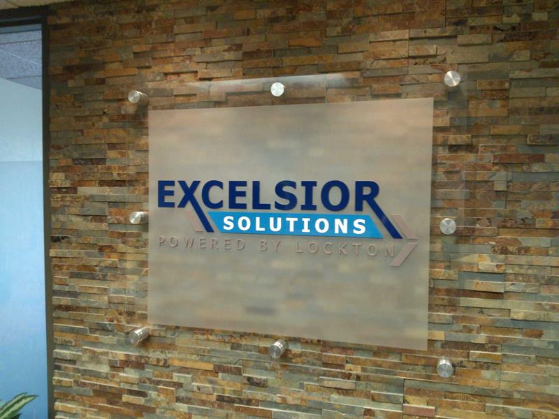 Gallery Image Excelsior_Solutions_sign_installed_8-18-14.jpg