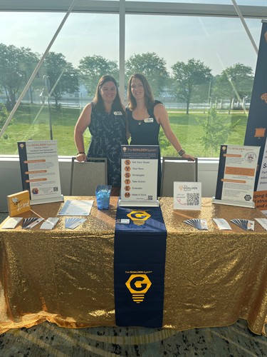 Kate Wade & Krissy Metzler sharing information about the services of The Goalden System.