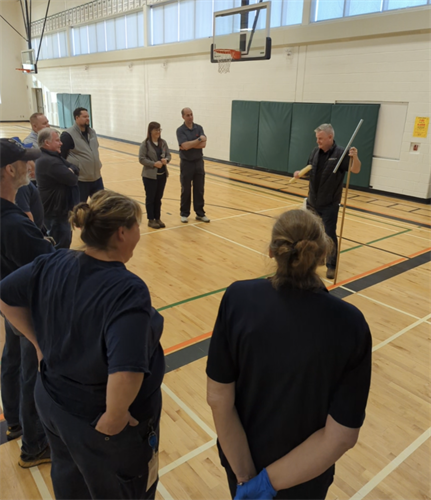 Training on how to redo a gym floor 