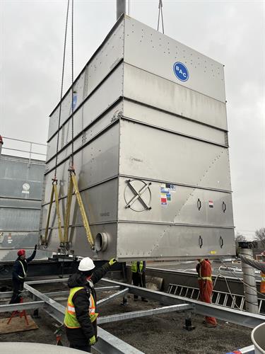 Installing a cooling tower.