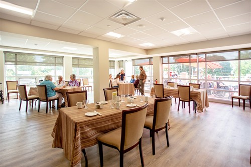Dining areas on each floor have plenty of windows that are southwest facing with views of the historic Queen's Park and neighbourhood