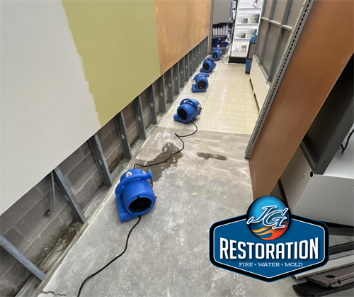 At one of Our commercial jobs drying out the walls.