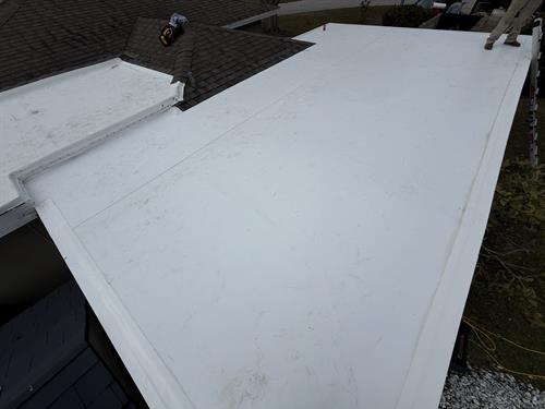 TPO carport roof replacement and tie into existing steep slope