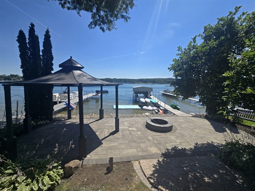 Lakeside brick firepit and paver patio with gazebo