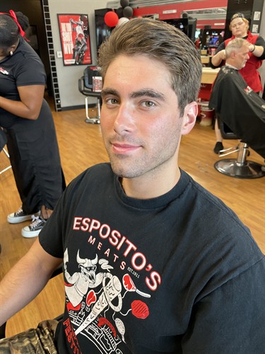 Medium clipper cut blended into an easy-to-style quiff, a precision haircut from Sport Clips Haircuts serving Sarasota and Manatee County.