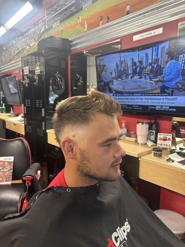 The sides of this O fade run to skin around the ear and temple, then blend up into the longer hair on top. Stephanie on our team left the top textured for the faux hawk.  Our Lakewood Ranch store is at Center Point at Waterside on University Pkwy, next to Owen's Fish Camp, in Sarasota County. Walk in or use online check-in.