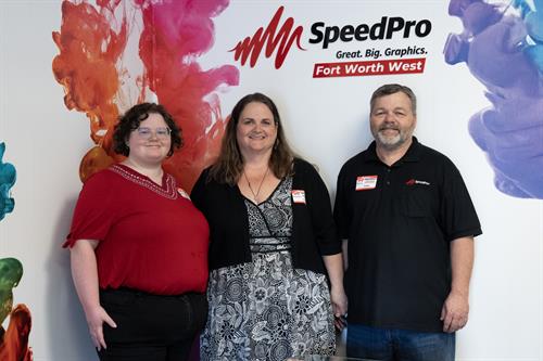The team at SpeedPro Fort Worth West includes production manager Megan Hoke and owners Sharisa and Chris Hoke.