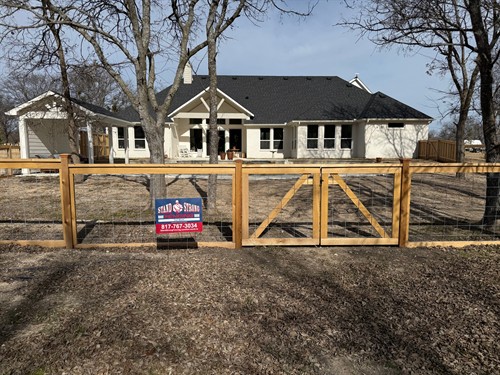 4' cedar ranch style fence with cattle panels installed by Stand Strong Fencing of Fort Worth