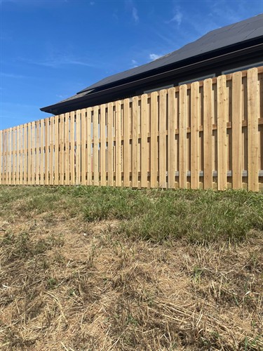 6' Natural cedar fencing in the shadowbox style installed by Stand Strong Fencing of Fort Worth