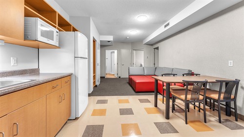 Residence Accommodations - Living Room & Kitchenette