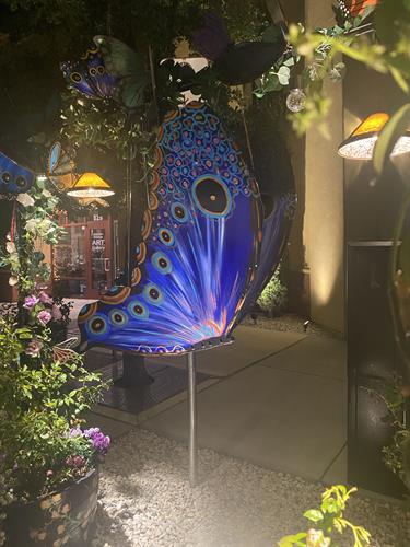 The Giant Blue Morpho with the HoOponopono Clearing Prayer on the wings of the butterfly on the corner of 10th and Pine.