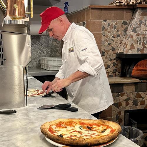 Pat mastering his craft at La Notizia, a Michelin star pizzeria in Naples, Italy 
