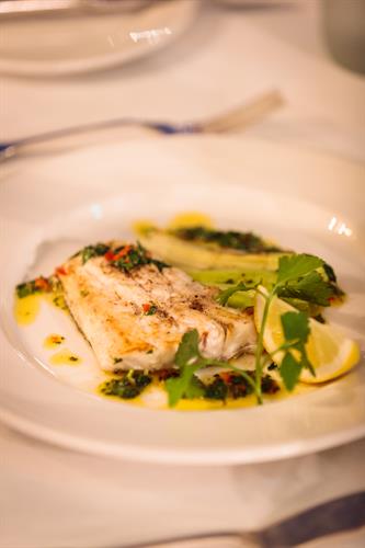 Gallery Image Pan_seared_Ballycotton_Hake_with_buttered_garden_leeks_and_red_pepper_and_marjoram_olive_oil_close_up_of_food_only.jpg