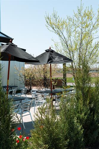 Gallery Image Spring-Patio-at-45th-Parallel-Distillery-Restaurant-2025-2.jpg