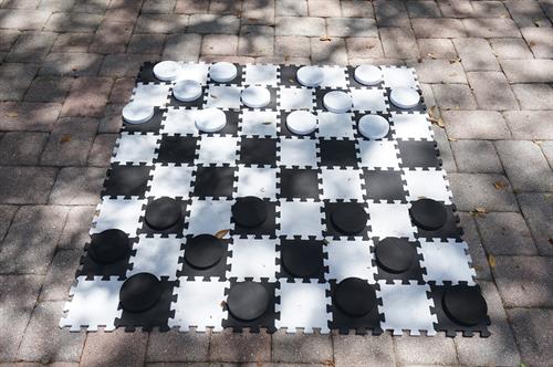 Giant checkers, which can be converted into Tic Tac Toe