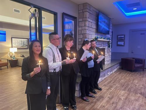 The team singing Silent Night during our candle lighting ceremony