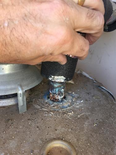 You should regularly check your water heater connections for leaks and corrosion