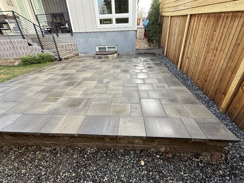 Paver patio in the back yard.