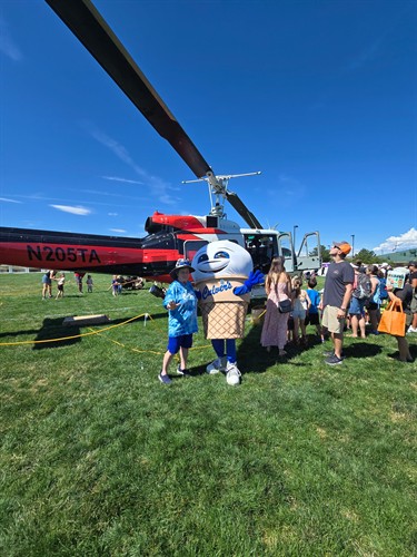 Scoopie with our Team Member, Patti during the Touch-a-Truck event.